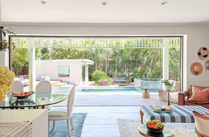Touch Interiors living by the pool with summer inspired colors