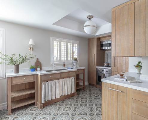 Touch-Interiors-Kitchen wood cabinets with sink curatin